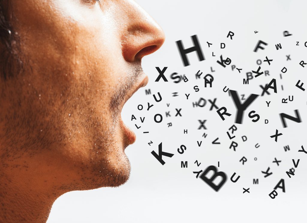 Letters tumbling from a speaker to suggest the flow of speech breaking up